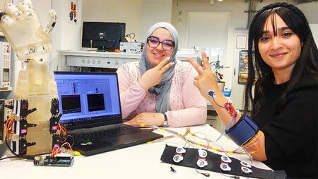 Two women work in the laboratory.